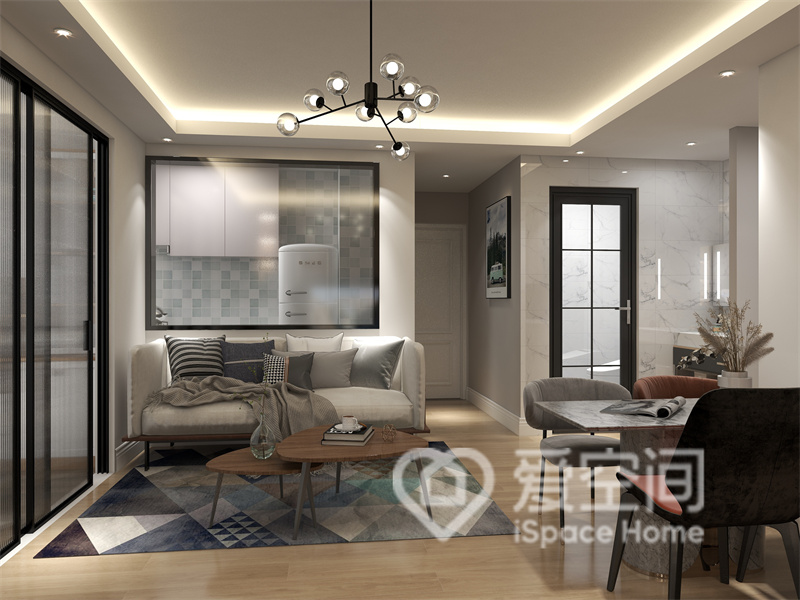 客厅的设计以现代简约为主，多以高级灰为主调，搭配温润的木质，营造极具设计感而又舒适的居住空间。