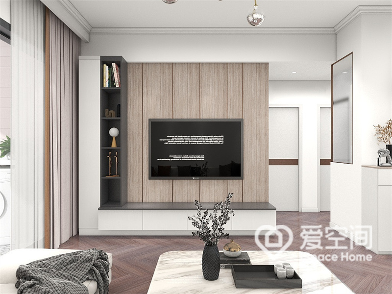 客厅设计简约，电视墙以木材为底色，加入L型白色收纳柜，营造出充满高级感的空间氛围。