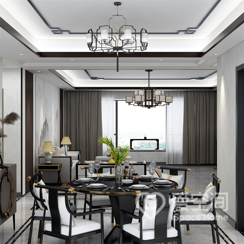 餐厅的配色冷暖调和，吊顶水格调优雅，中式家具元素相互碰撞，塑造出淡雅的用餐氛围。