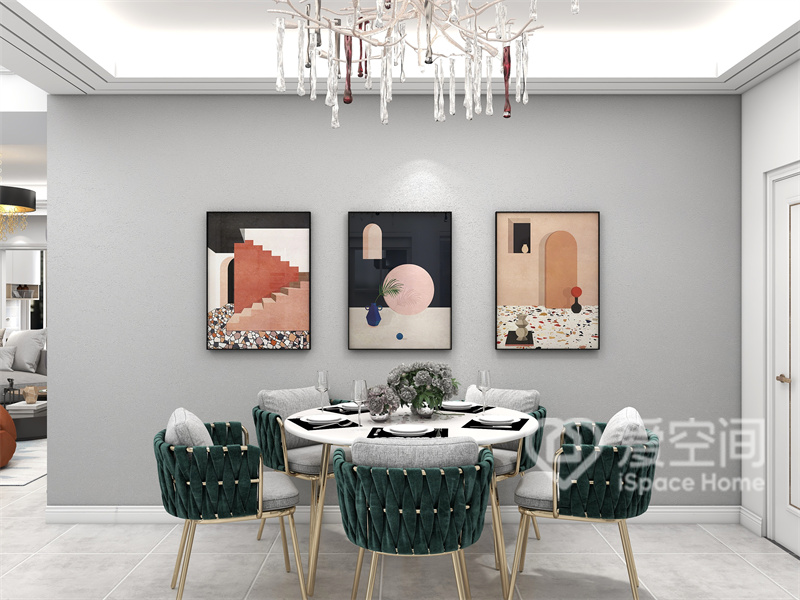 灰色调带来淳朴的空间质感，背景装饰描摹出时尚的气息，精致的餐桌椅符合业主对时尚感的追求。