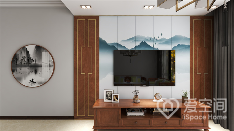电视背景采用木材和护墙挂画来装饰立面，成就了天然之韵，胡桃木地柜做工精湛，造型典雅。