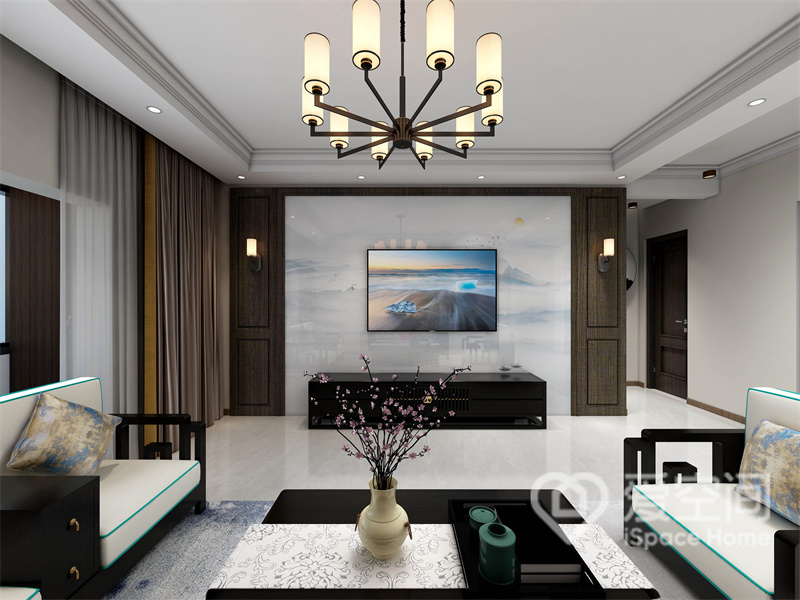 在简洁的客厅空间中，电视墙选用对称的设计手法，在照明的渲染下表达出与众不同的清雅。