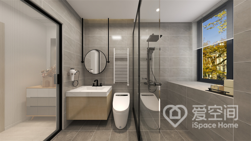 卫浴间采用干湿分离布局，米色调空间舒适而温馨，白色洁具占据了视觉中心，空间显得优雅大气。