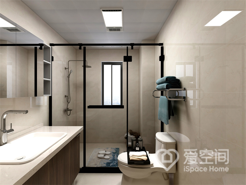 卫浴空间整体以米白色为主，辅以玻璃进行干湿分离，加以白色洁具点缀，空间变得通透而完整。