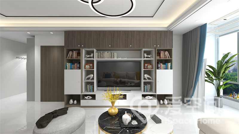 电视墙与空间色调保持一致，收纳柜的融入让局部更具层次感，木材点缀下客厅纯净而温暖。