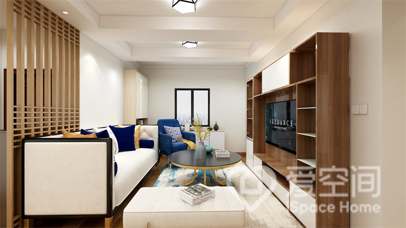 客厅的设计简约含蓄，沙发呈现出现代精工品质，收纳柜不仅满足了储物需求，也提升了空间魅力。