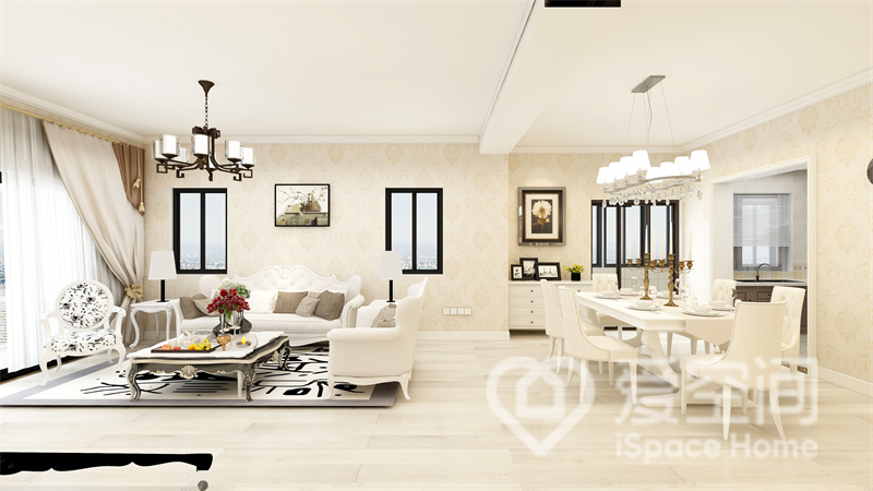 客厅与餐厅一体化设计，米白色系给予了空间简奢的基调，欧式家具带来高雅、迷人的生活氛围。