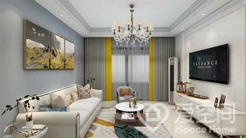 客厅作为社交场所，蓝色与白色搭配令空间浪漫而简雅，优质的白色家具装点其中，呈现出别样的艺术气息。