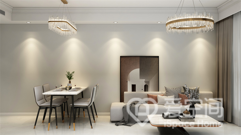 客餐一体设计，精致的吊灯点亮了空间，白色家具优雅温馨，背景装饰画凸显出现代时尚感。