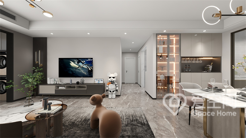 客厅与餐厅一体化设计，室内家具简单而实用，精致的软装展示出优雅和耐用性，增强了空间的实用氛围。