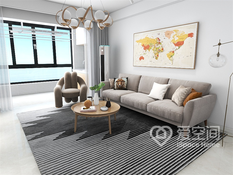 客厅以白色调为主，家具造型简洁，灰色沙发和几何地毯沉稳大气，自然与舒适和谐的融合在一起。