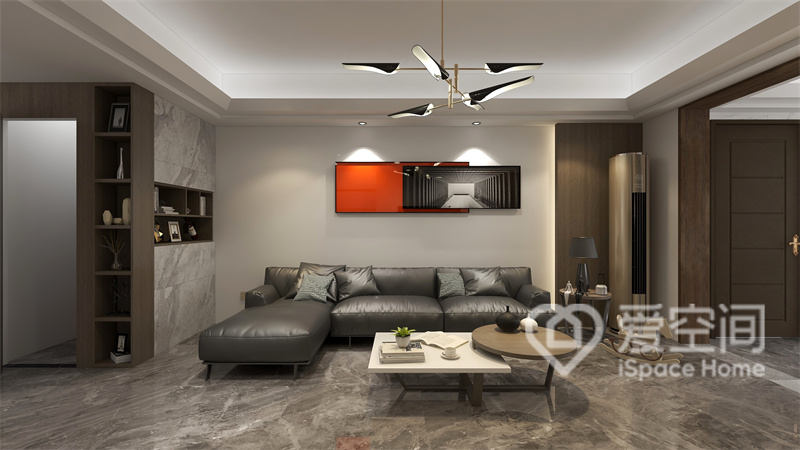 客厅选用简约的设计手法，沙发与茶几和谐有序的搭配组合，暖色装饰画衬托出时尚的空间情感。