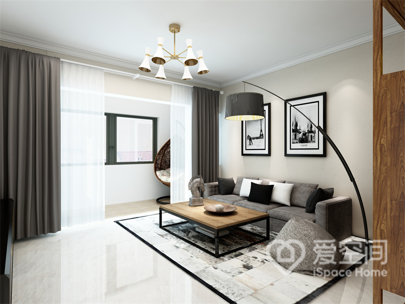 客厅主要以灰色和白色为主要色彩，简雅的布艺沙发呈现出明快简雅的现代氛围，落地灯提升了层次感。