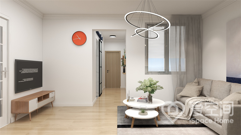米白色背景让客厅空间变得更加温馨干净，布置家具、绿植的融入展示出现代空间的清新感。