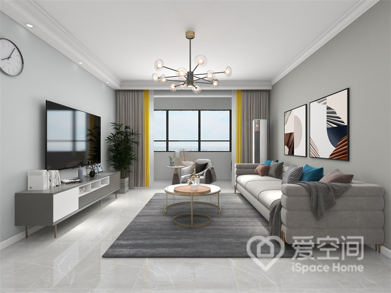 客厅以稳重的灰白色为主，适当加入现代质感的家具元素，营造出一种整洁、大气的空间氛围。