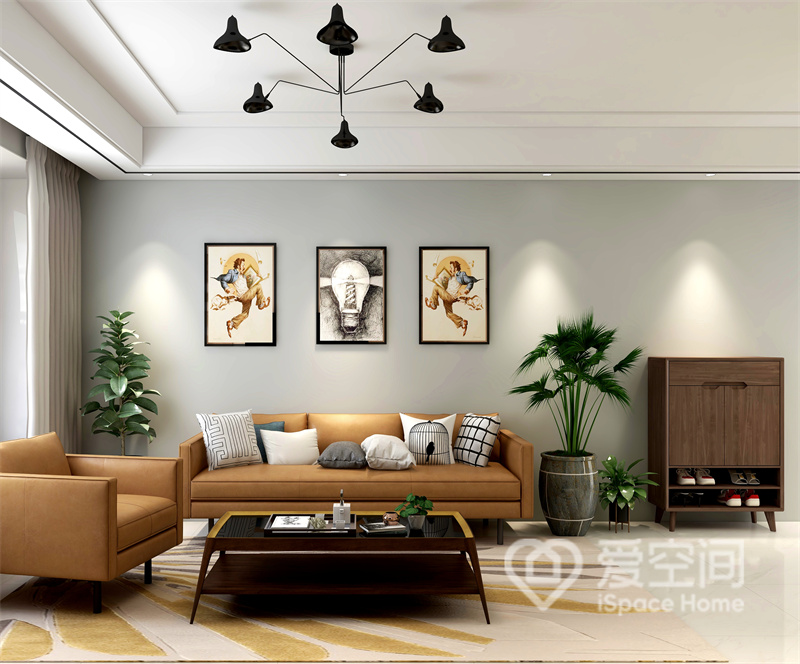 客厅的设计手法很克制，吊顶设计简单，黑色灯具与白色墙面形成对比，焦糖色皮质沙发增添了北欧质感。