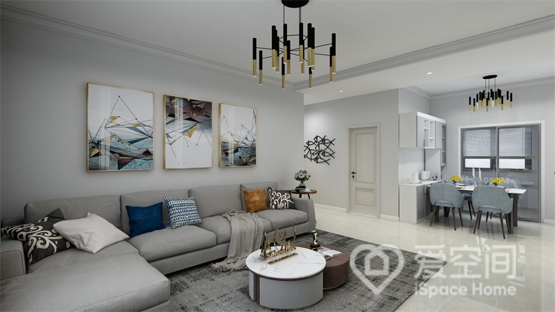 客厅的光线充足，为了提升明亮感，设计师以浅蓝色为背景，并搭配灰色系布艺沙发，诠释出简雅的生活氛围。