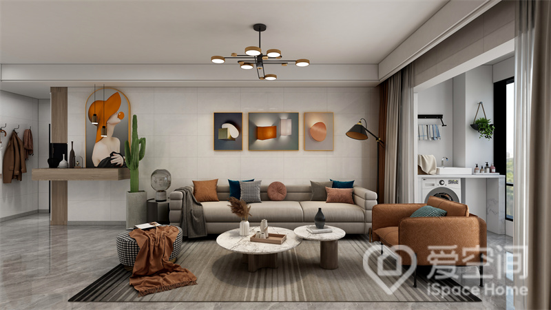 客厅清新素雅，以净白的墙面与布艺质感的家具组合，呈现出一种现代风格独有的温馨感和归属感。
