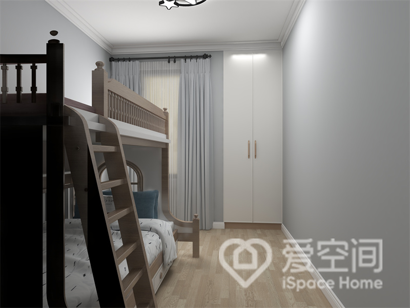 儿童房格局紧凑，空间以温雅的灰色调为背景墙，高低床提升了空间利用率，彰显出舒适的生活品味。