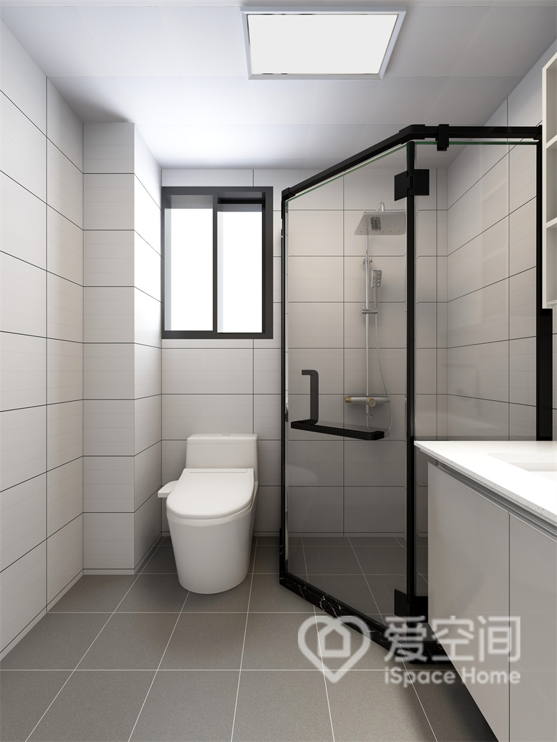 卫浴间使用了干湿分离，黑色线条勾勒出潇洒自如的生活氛围，白色洁具装点其中，为空间增添了几分洁净感。