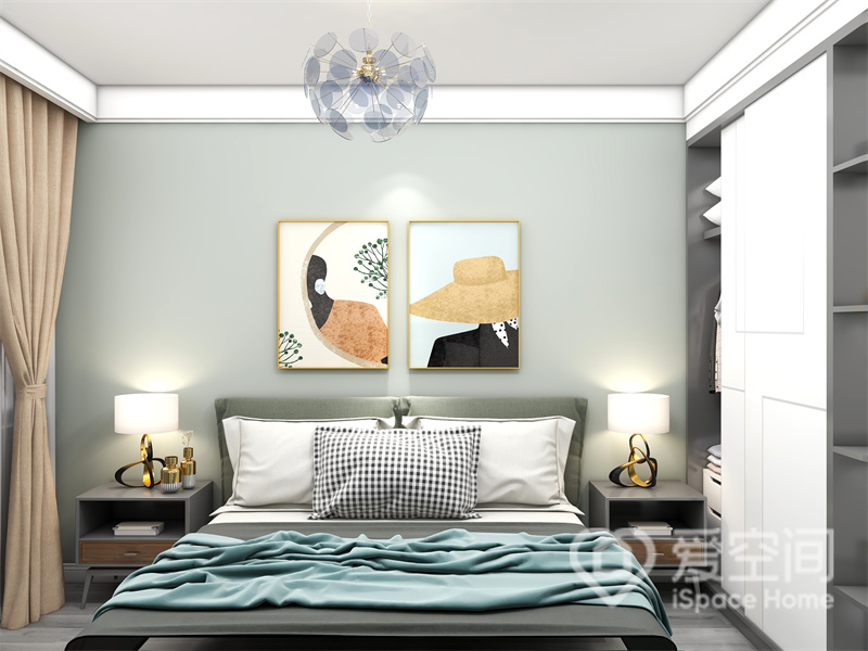 浅绿色背景墙营造出清新惬意的次卧氛围，搭配橘色调装饰画点缀，丰富了空间层次，增加了卧室的温馨质感。