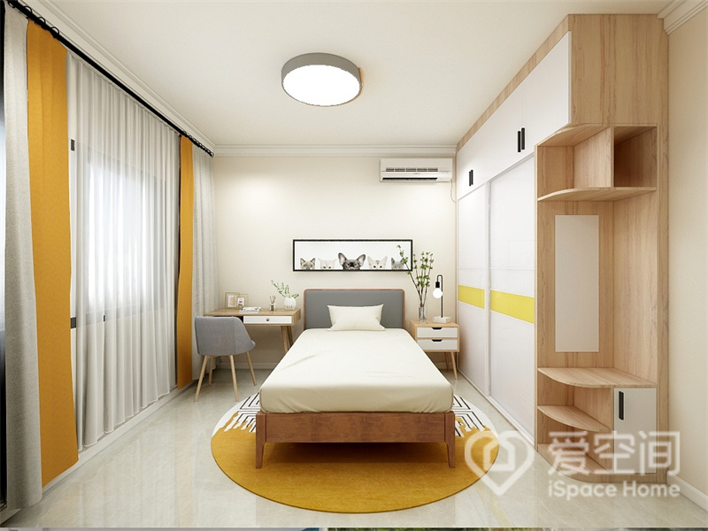 次卧空间中，黄色、原木色与白色的交错过程中，唤醒了律动美感，呈现出温婉、时尚的都市气质。