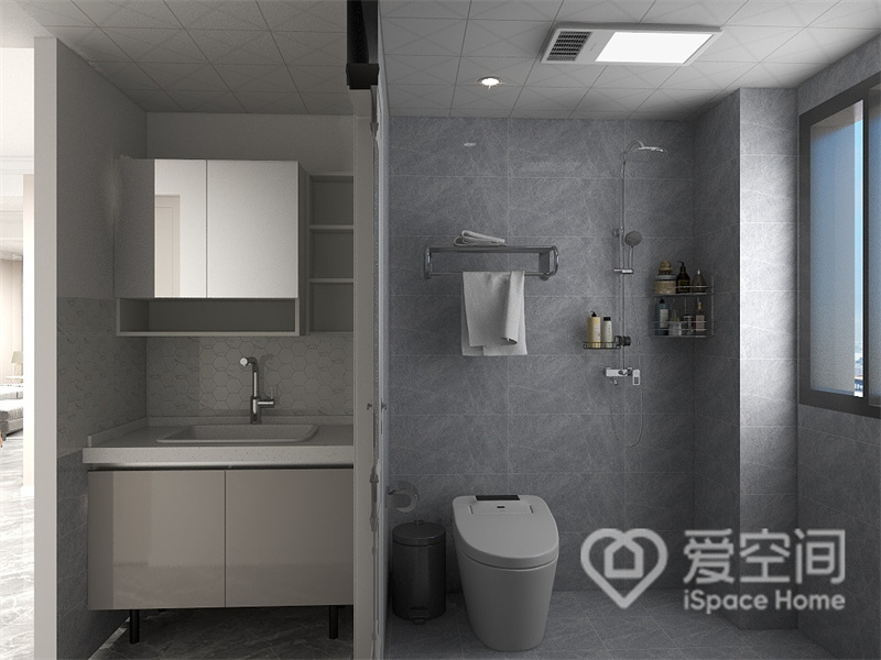 卫生间做了二式干湿分离，背景铺贴灰色墙砖，加以白色洁具点缀，带来与众不同的感官体验。