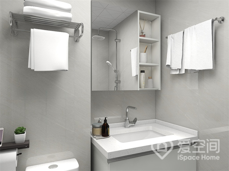 卫浴间配色优雅舒适，设计师注重收纳设计，在白色调的洁具衬托下，空间显得干净整洁。