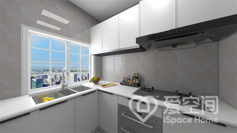 厨房背景整体以灰色为主，保证了空间的简约质感，加入白色橱柜，塑造出硬朗简洁的现代感。