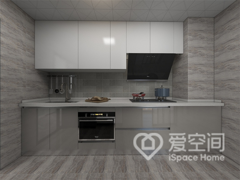 厨房以米白色作为主基调，透过简单利落的线条元素，以及一字型的橱柜布局，塑造出高品质的烹饪空间。