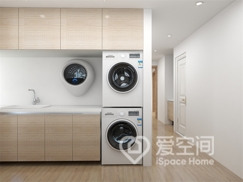 浅木色的橱柜这让厨房空间增加了几分温馨感，白色洗衣机嵌入式设计冲击着视觉，增加了厨房的功能感。