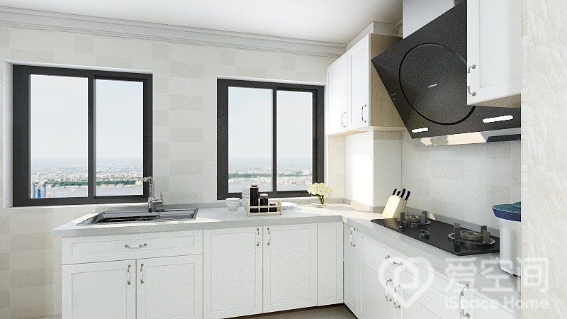 厨房舍弃多余的空间布置，用白色橱柜凝练出简约的烹饪氛围，黑色电器的嵌入让空间有了律动感。