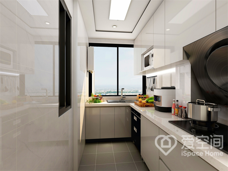 厨房区域整洁简约，吊柜与橱柜造型隐形效果好，L型动线布局令日常操作更加舒适，提升了生活效率。