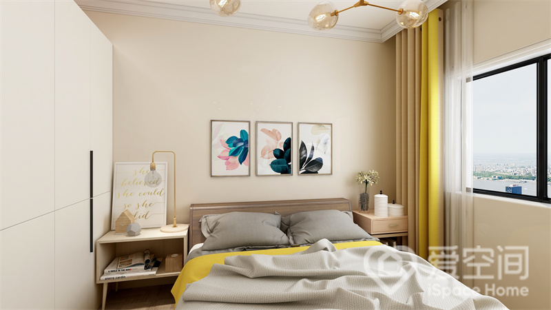 背景墙上的装饰画让主卧空间自然而文艺，配色的设计具有现代化，黄色与灰色搭配展现出个性色彩。