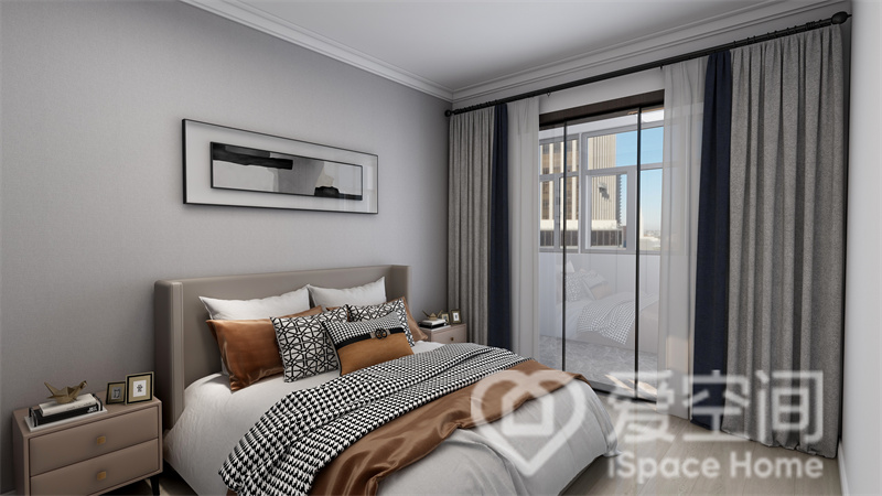 主卧的设计大方简洁，灰色背景空间中加入爱马仕橙点缀，营造出舒适、温雅的卧室环境。
