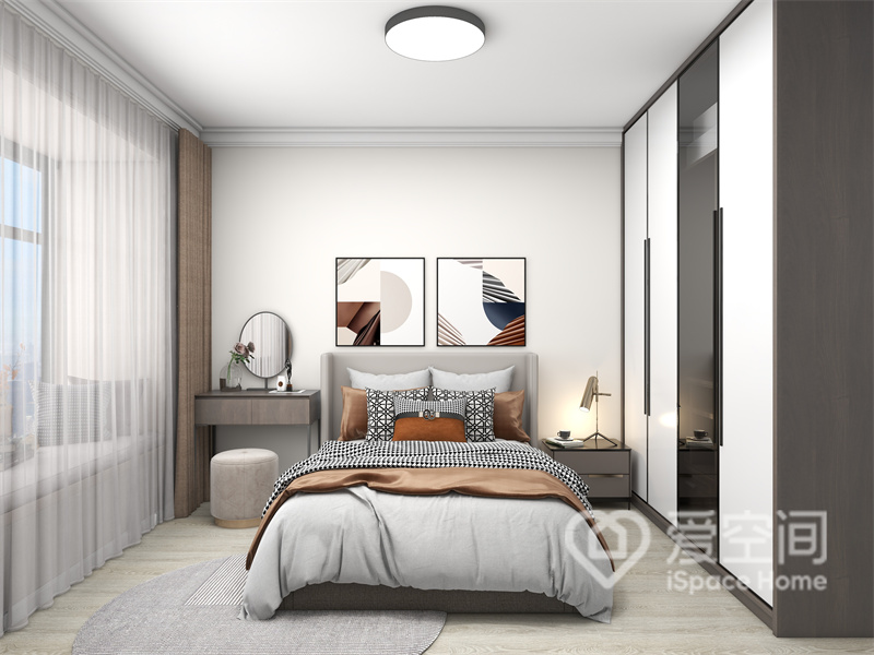 米白色基调带来温馨的卧室，灰色与橘色床品搭配，流露出精致的空间氛围，整体显得简约而优雅。