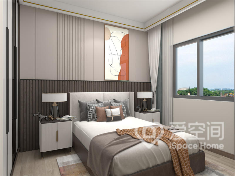 次卧中，背景墙拼色设计撞出是高级质感，软装主要以现代简约元素为主，营造出了温馨舒适的氛围。