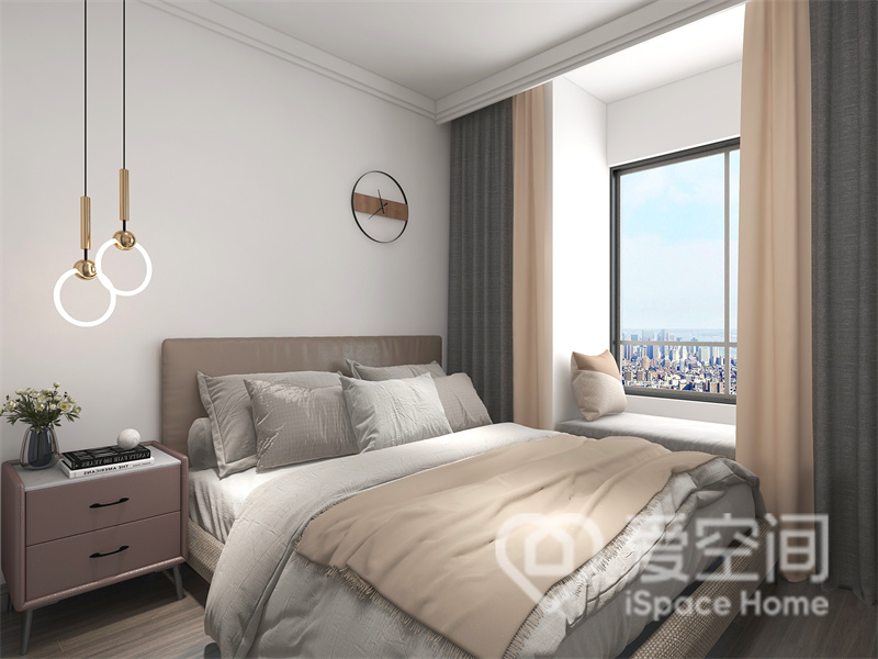 次卧的面积紧凑，简约的装饰元素让空间变得更加精致简约，飘窗的设计拓展了空间视野。