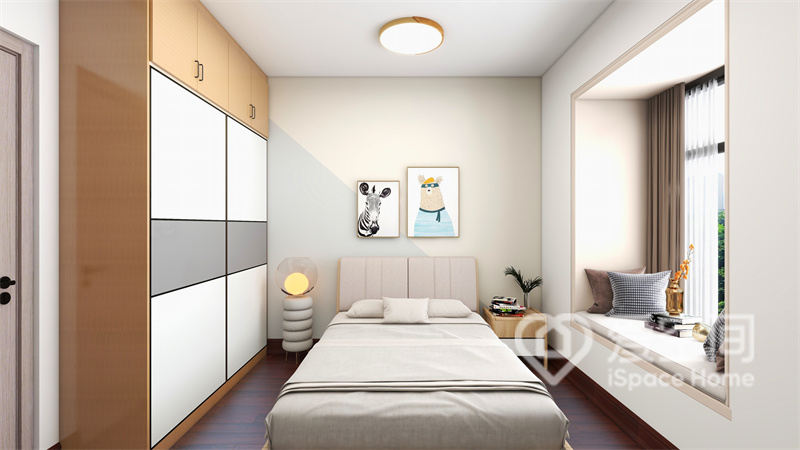 次卧没有繁杂的设计元素，米色背景墙带来温馨感，衣柜利用不同材质的混搭设计，丰富了空间情绪。