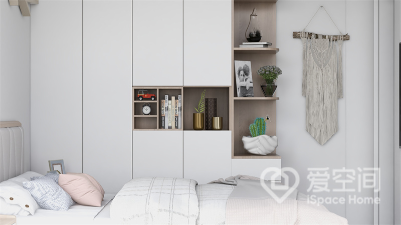 次卧以白色调为主色，铺设简洁有序的家具，白色的柜面和床体让空间变得更加明亮舒适。