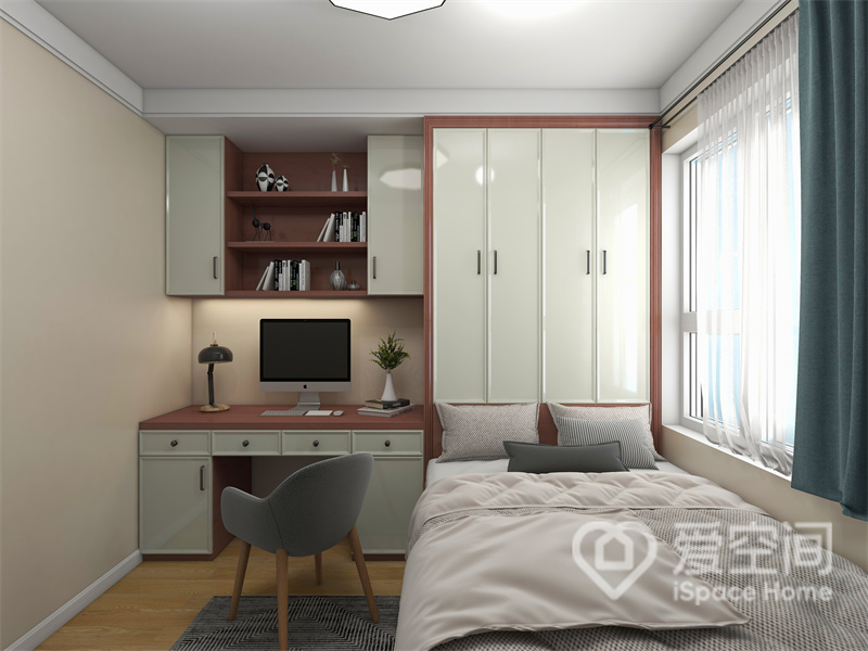 次卧空间中，设计师合理地运用了榻榻米一体柜，创造出一个平静舒适的生活空间，提升了空间利用率。