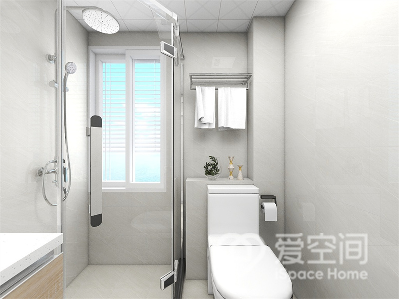 卫生间选用灰白色砖面为背景，干湿分离展现出精致的现代气息，给家庭地阿莱舒适的生活体验。