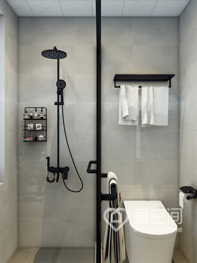 卫生间低调素净，干湿分离提升了空间的使用率，黑白洁具简单大方，塑造出安静的卫浴氛围。