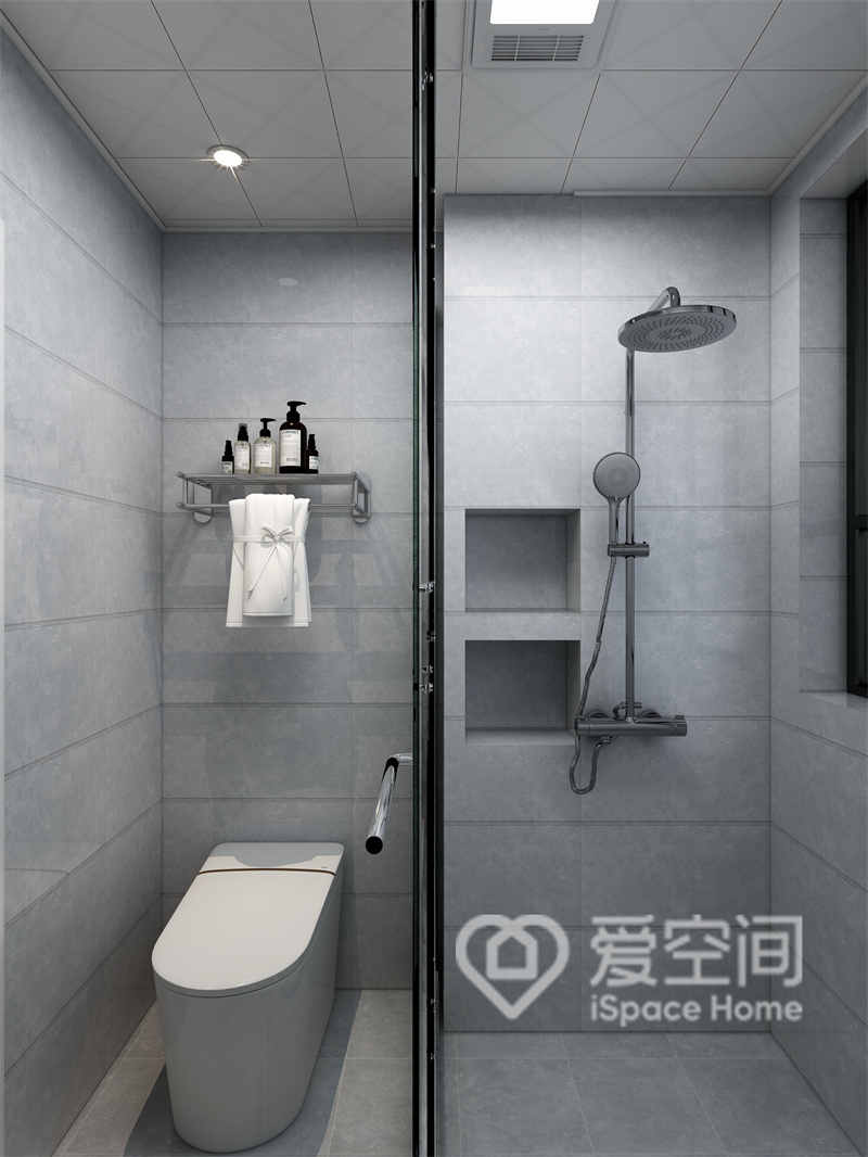 干湿分离令卫生间充满设计感，设计师使用温润的灰色砖面为背景，搭配白色洁具，营造出宁静和谐的空间氛围。