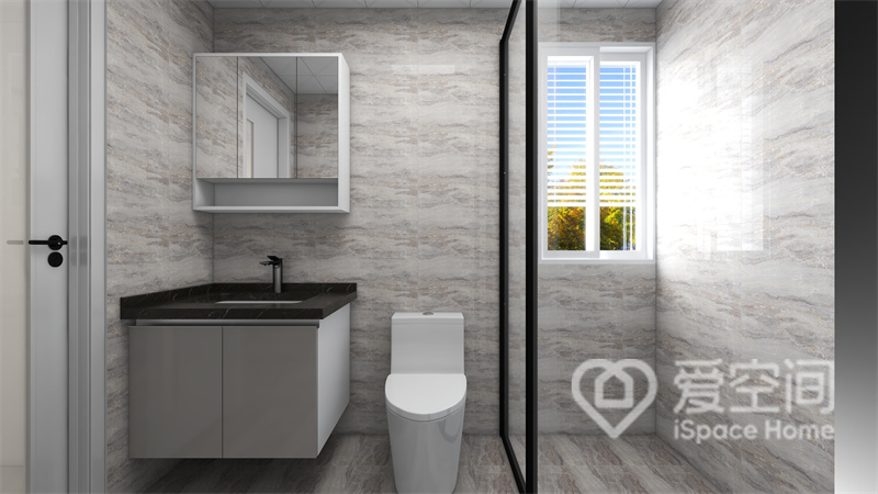 卫浴空间的墙面和地面色彩保持了统一，干湿分离设计打造出美感与使用性兼具的功能空间。