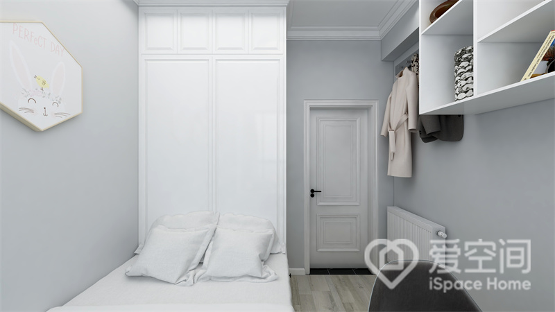 次卧格局紧凑，灰色调背景与白色家具形成对比色，令空间更显优雅，搭配简约的软装点缀，空间自然而舒适。