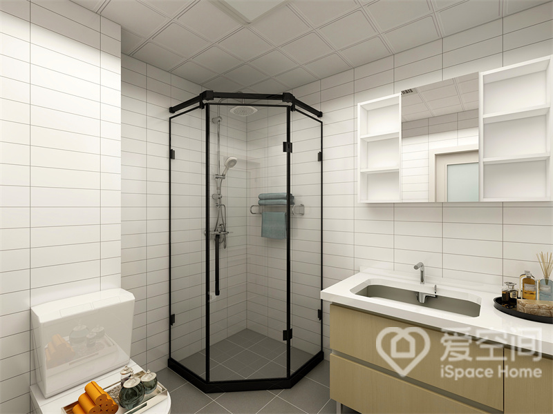 为了避免白色空间的单调性，设计师做了干湿分离，并用黑色线条勾勒浴缸空间，赋予空间层次感。
