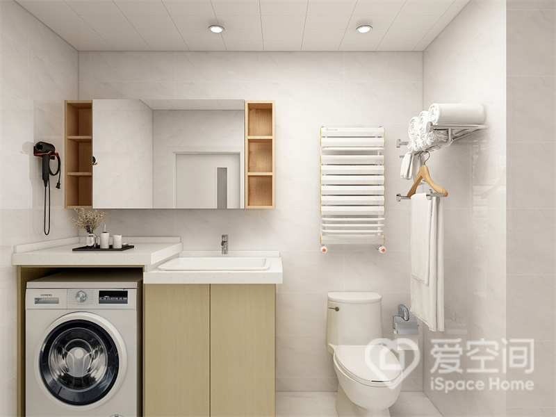 卫浴空间以柔和的白色为基调，折射出干净明亮的生活氛围，洗手台定制设计，预留出洗衣机位，提高了空间利用率。