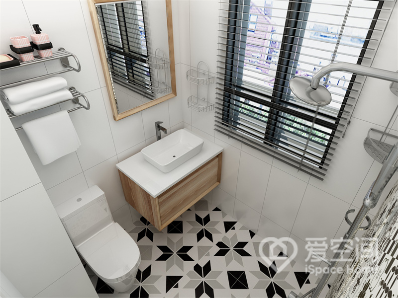 卫浴空间整体以白色为主，地面铺设了黑白砖面，提升了生活情调，干湿分离优化了生活动线。