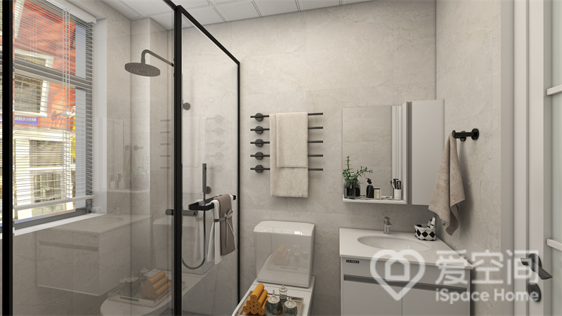 卫生间米色背景墙温润质朴，白色洁具装饰其中，令空间格外整洁，设计师运用干湿分离构建出更加高效的生活空间。